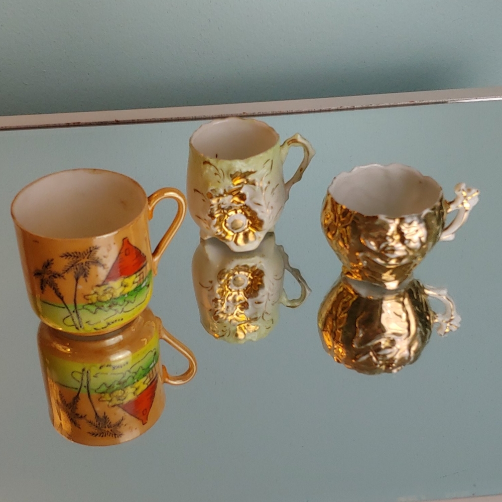 Three small vintage coffee cups